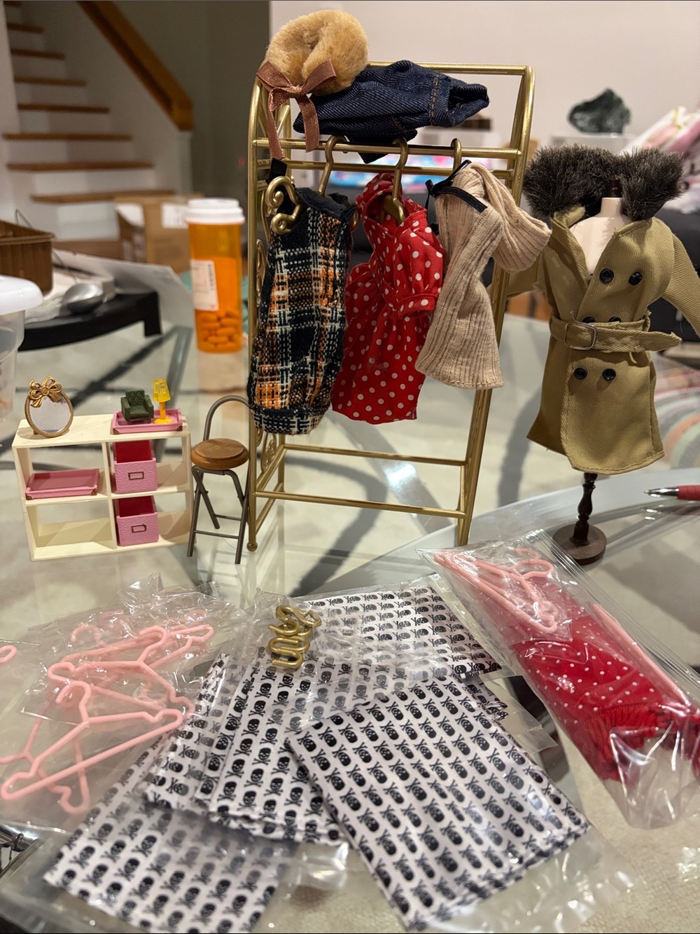 Miniature Clothing Rack with Red Polka Dot Dress and Neutral Accessories